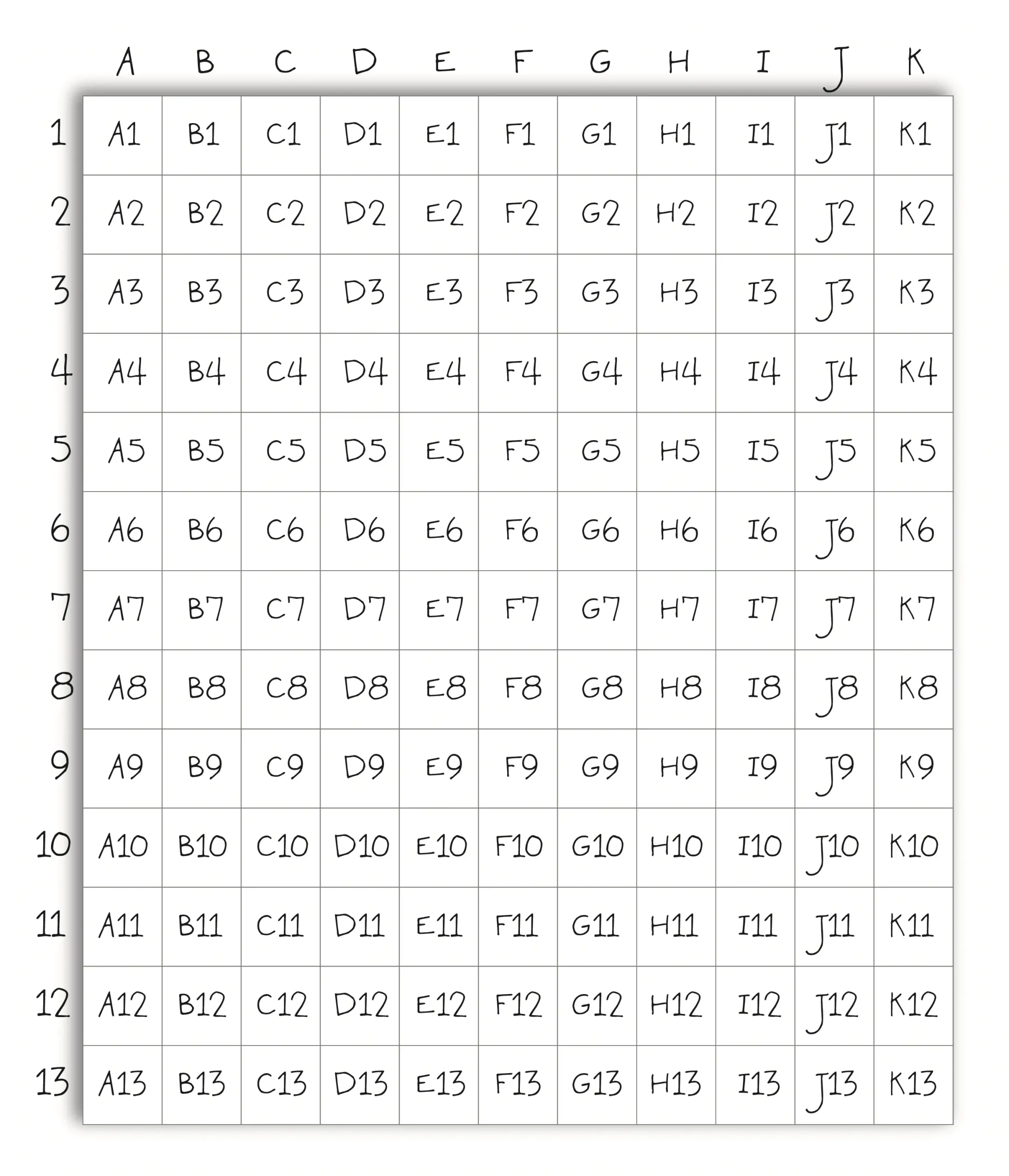 Cuadrados de tela blanca identificados con letra y número para el Bubble Quilt